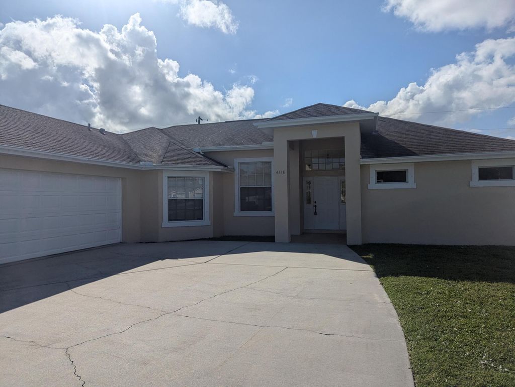 Photo of 4118 SW Darien Street, Port Saint Lucie, FL 34953 (MLS # R11032792)