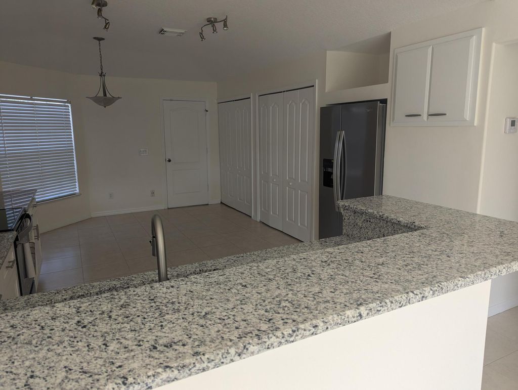 Photo of 4118 SW Darien Street, Port Saint Lucie, FL 34953 (MLS # R11032792)