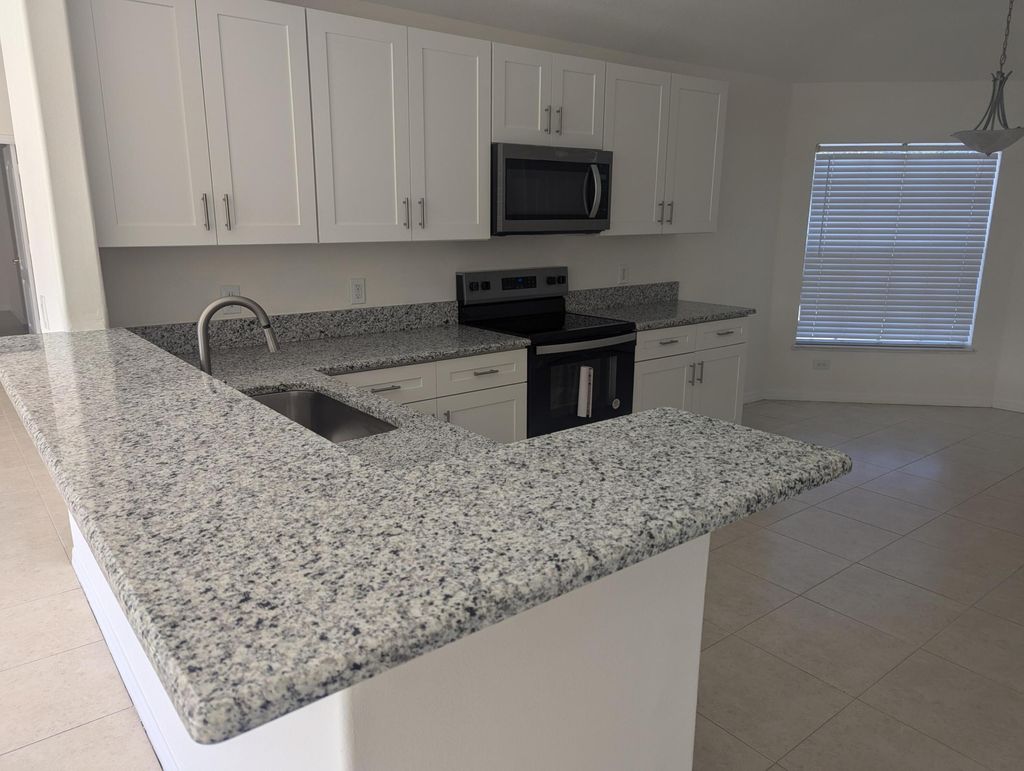 Photo of 4118 SW Darien Street, Port Saint Lucie, FL 34953 (MLS # R11032792)