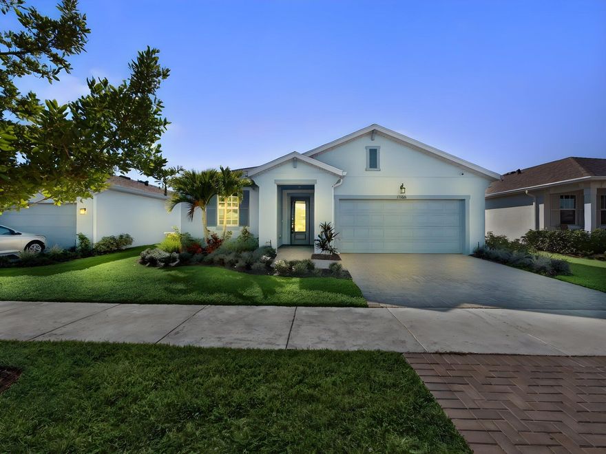 Welcome to this beautifully upgraded 4-bedroom, 3-bath, 2-car garage home with a private pool, located in the highly sought-after Cadence at Tradition. This move-in-ready residence features impact glass throughout, tinted windows and doors, LED lighting, crown molding in living areas, and tile flooring throughout the entire home for a clean, modern feel. The gourmet kitchen is a standout with quartz countertops, a farmhouse sink, gas stove, soft-close drawers and cabinets, pull-out garbage, a walk-in pantry, and a new garbage disposal--perfect for both everyday living and entertaining. The home also includes gas dryer and water heater for added efficiency. Retreat outdoors to your oversized screened patio complete with a privacy sun shade, outdoor kitchen, and a 12x24 chlorine pool.