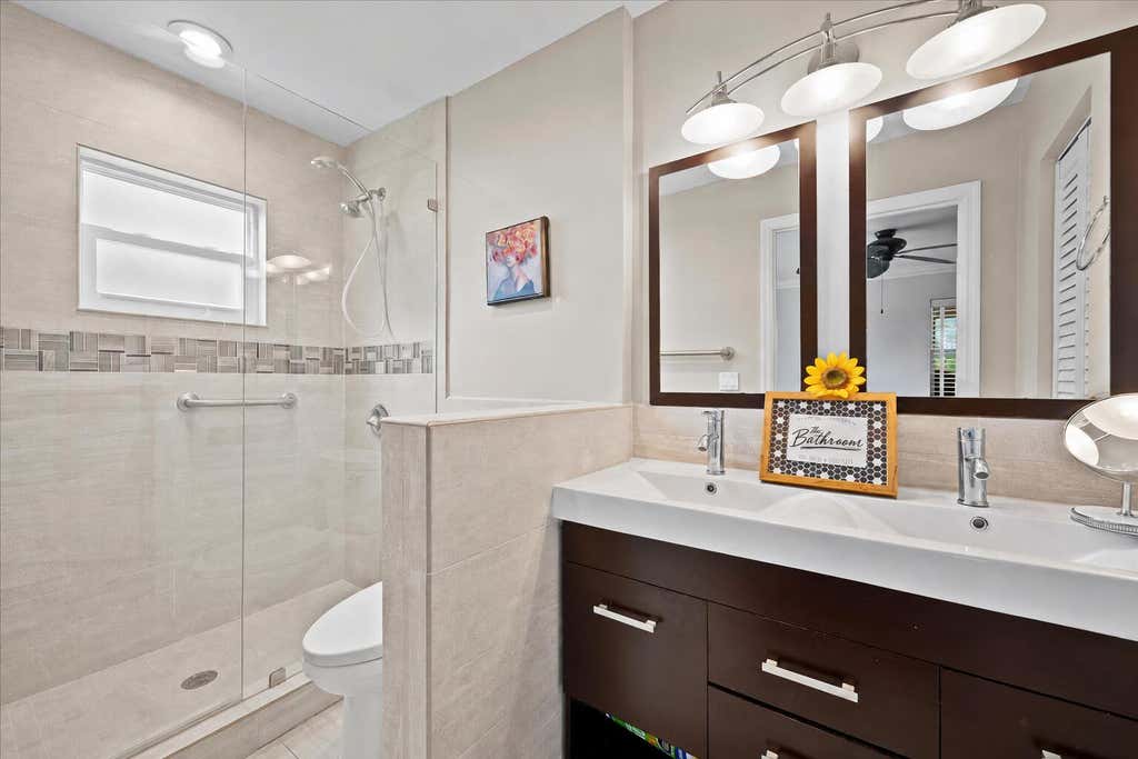 Photo of 206 Lake Susan Lane, West Palm Beach, FL 33411 (MLS # B26069371)