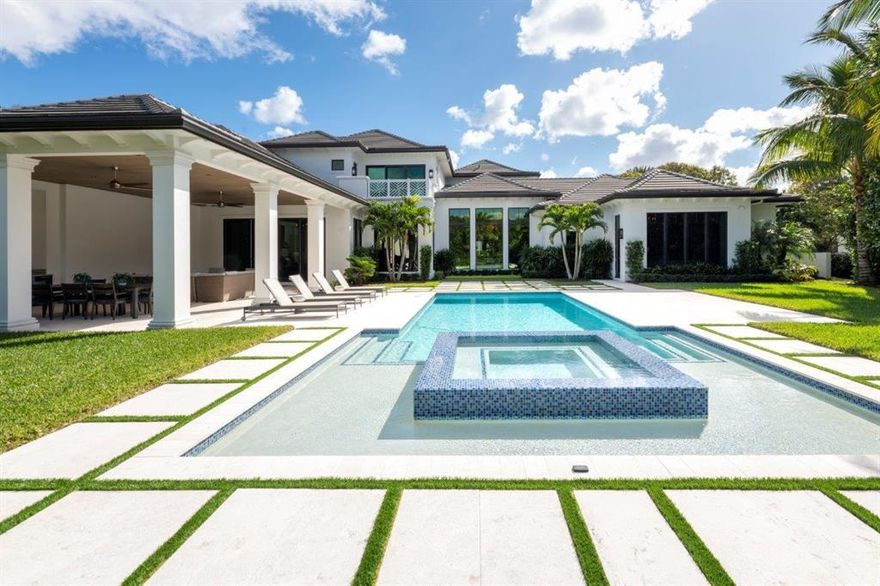 This impressive residence was built in 2019 by esteemed builder Courchene Development, w/ superb details implemented by luxury designer Insignia Design. 
This unique property is offered with a RARE TENNIS membership and is located on a cul-de-sac on one of the most private streets in Admirals Cove, enabling a quick walk or golf cart ride to the courts or the 1st tee, clubhouse or your boat (on site marina slips are available!). 
Oversized lot (.64 acre) expansive front & back yards as well as coveted extra parking & breathtaking curb appeal. Exquisite detail & impeccable design is found in this transitional West Indies property offering a combination of warmth & function. This 4 BD/6 BA residence with home gym (potential 5th bedroom) and a split floor plan entailing 7,730 LSF/10,800 TSF. Upon entering the grand foyer, you are greeted with soaring 14 foot ceilings and breathtaking design at every turn. The open floor plan invites entertaining, with a custom bar, marble floors and timeless living and family room area. Enjoy preparing meals in the gourmet kitchen with professional grade appliances, complete with butler's pantry and large walk-in pantry. View the latest movie or watch your favorite sports team in the oversized theater with luxury seating for 10.  Exercise at your convenience in the stellar home gym complete with multiple cardio machines, free weights and AXT-5 deluxe. Work from home in style with his and her separate offices complete with custom cabinetry. 
The serene master bedroom wing defines style with spacious his and her walk in closets and luxurious separate full ensuite baths. Enjoy holidays and events in the formal dining room with exquisite details. The custom staircase leads to a versatile, large loft area complete with kitchenette and beautiful balcony. Adjacent to the open loft are two spacious bedrooms each with full ensuite baths.
This property has meticulous internals with custom air purification, new HVACs, state of the art generator, impact glass as well as Control 4 audio/visual and home automation throughout and premier security network.
Enjoy breathtaking golf course views while relaxing under the oversized lanai and outdoor entertainment area complete with summer kitchen, Arhaus fire pit and serene pool area with expansive yard.
This turnkey property is being offered fully furnished including all art and accessories.
The Club at Admirals Cove encompasses the essence of luxury featuring a premier community with two spectacular clubhouses, 45 holes of exceptional golf, 5 restaurants, 63 marina slips, 12 tennis courts, 5 pickleball courts, brand new spa, Covesters kids club and Platinum service.
Call now to schedule a viewing of this world class property.