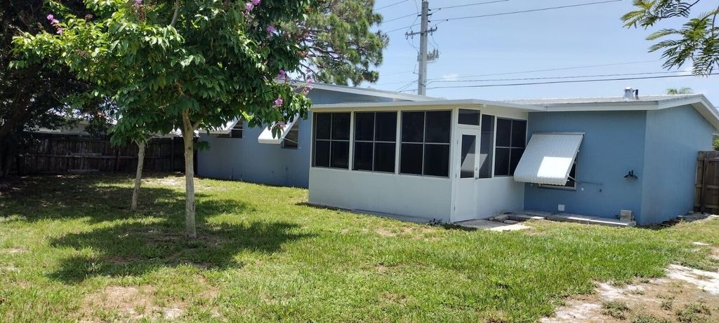 Photo of 225 NE Prima Vista Boulevard Blvd, Port St Lucie, FL 34983 (MLS # R10811186)