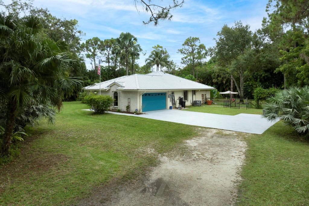 Photo of 13086 N 52nd Court N, The Acreage, FL 33411 (MLS # R11011207)