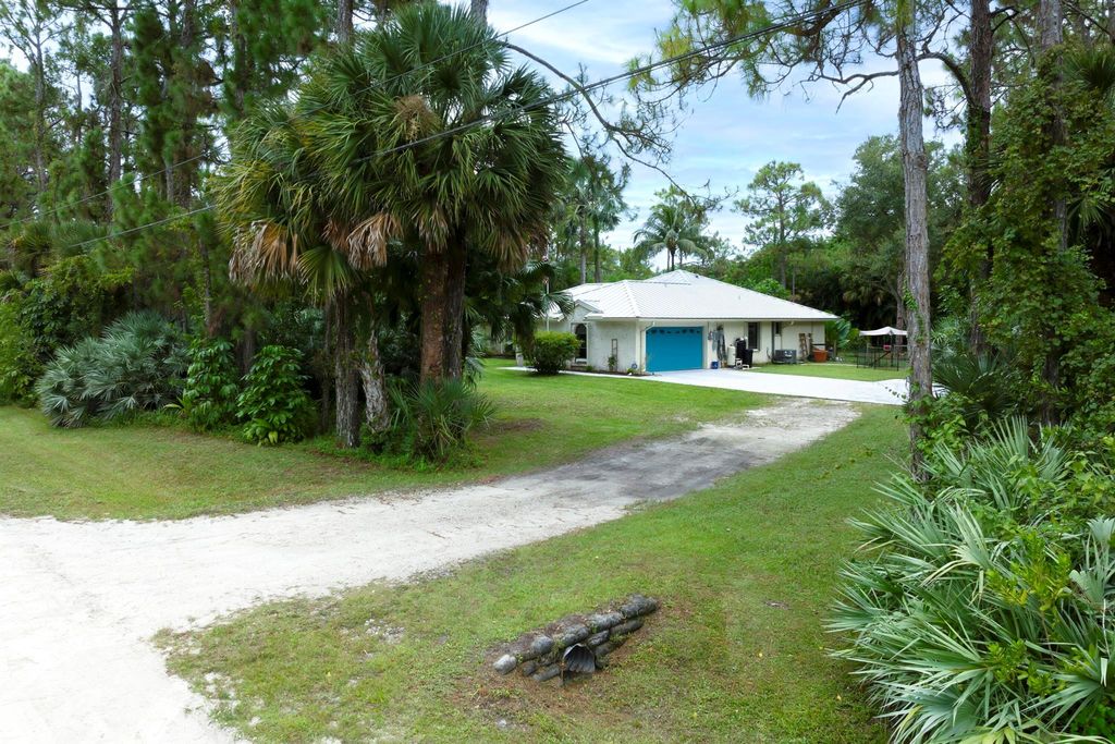 Photo of 13086 N 52nd Court N, The Acreage, FL 33411 (MLS # R11011207)