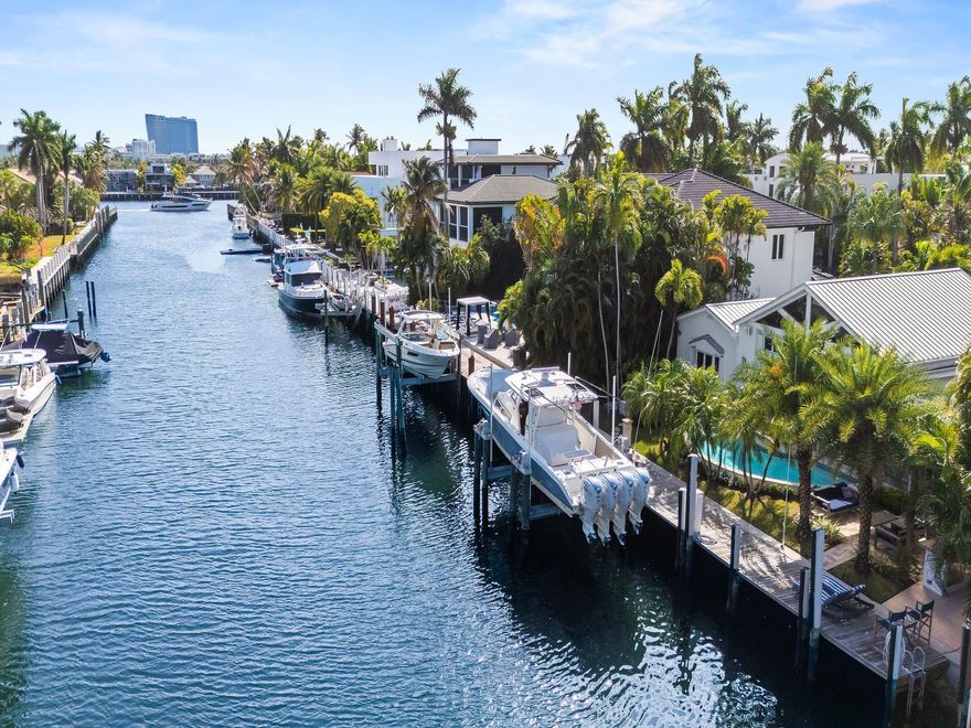 Charming Key West–style waterfront residence located on one of the most desirable streets of Las Olas Isles. Featuring 90 ft of DEEP-WATER FRONTAGE on a wide canal with NO FIXED BRIDGES. Perfectly positioned on the SOUTH SIDE of LAS OLAS ISLES, on one of the Isles’ widest canals, closer to the point. Surrounded by multimillion-dollar residences and just walking distance to the beach and Las Olas shopping and dining. Enjoy the coveted EAST EXPOSURE, heated pool, expansive entertaining space, BOAT LIFT, and a brand-new summer kitchen. This bright residence features 19-ft volume ceilings in the living room, three well-appointed bedroom suites, and a spacious, well-equipped open kitchen and family room. Truly a unique opportunity to reside on Las Olas Isles.
