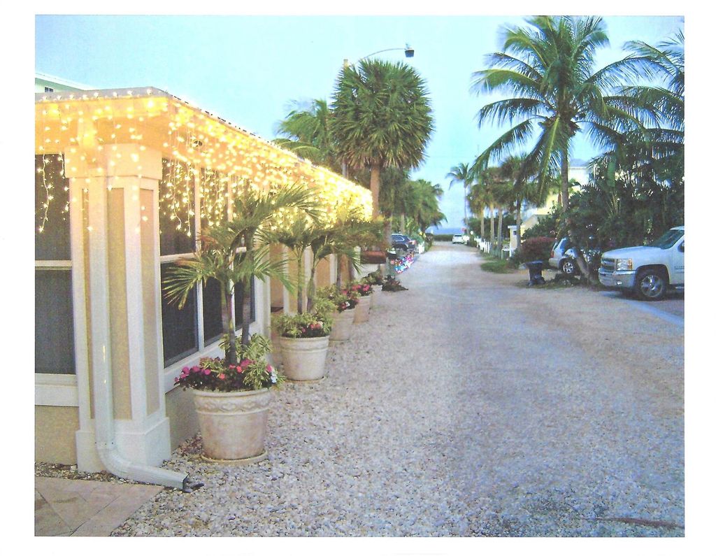 Photo of 551 Saturn Lane, Juno Beach, FL 33408 (MLS # F10432962)