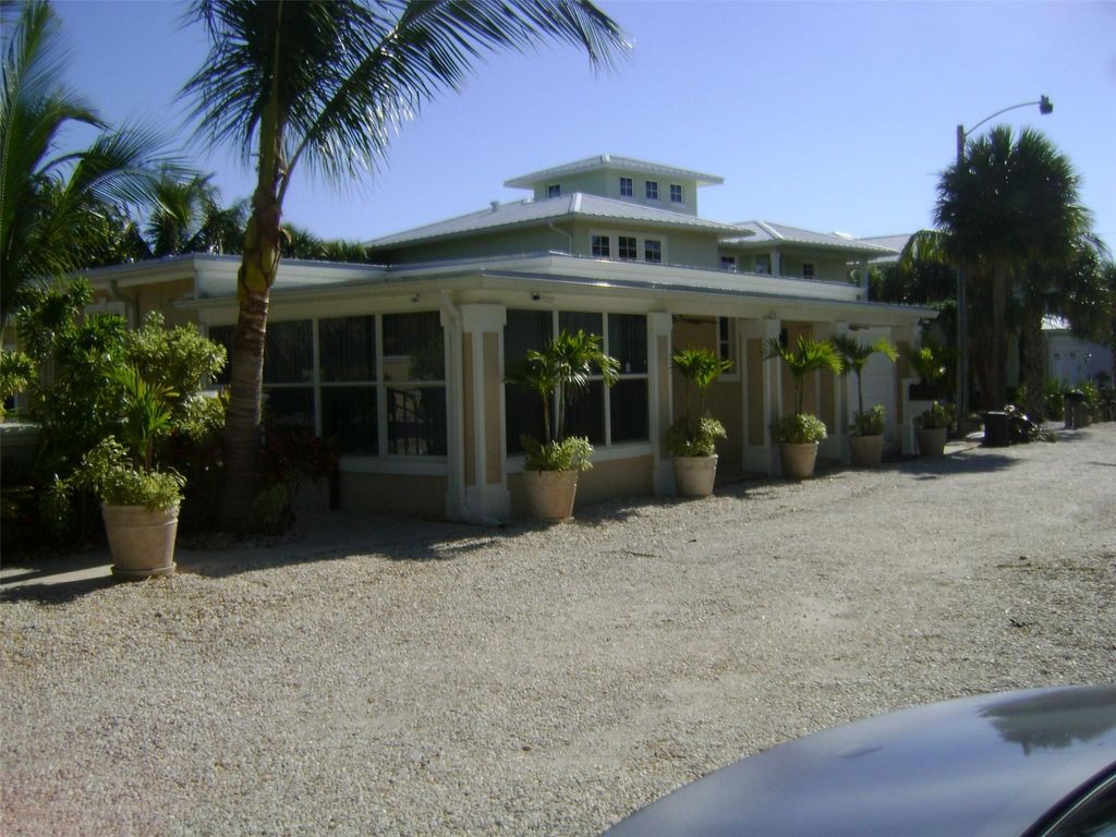 Photo of 551 Saturn Lane, Juno Beach, FL 33408 (MLS # F10432962)