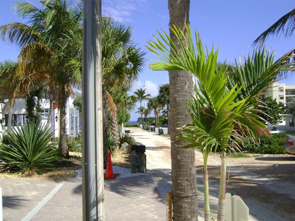 Photo of 551 Saturn Lane, Juno Beach, FL 33408 (MLS # F10432962)