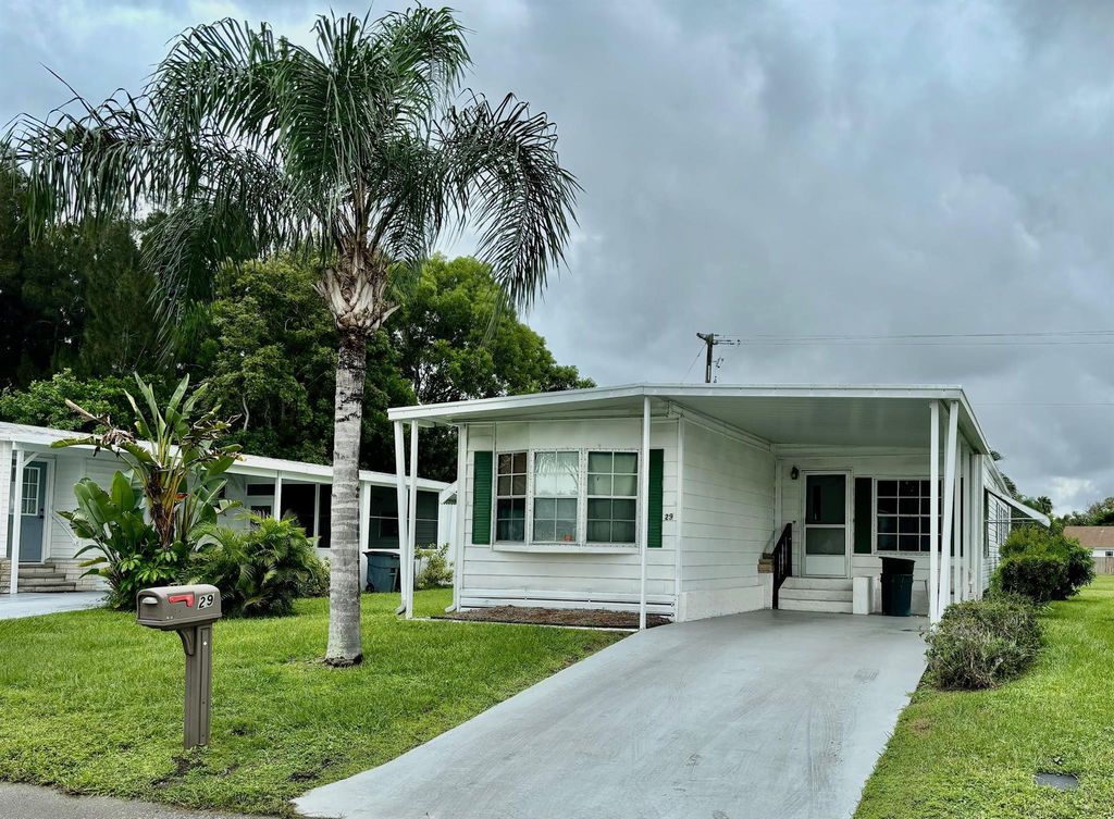 Photo of 29 San Marino Way, Port Saint Lucie, FL 34952 (MLS # R11024613)