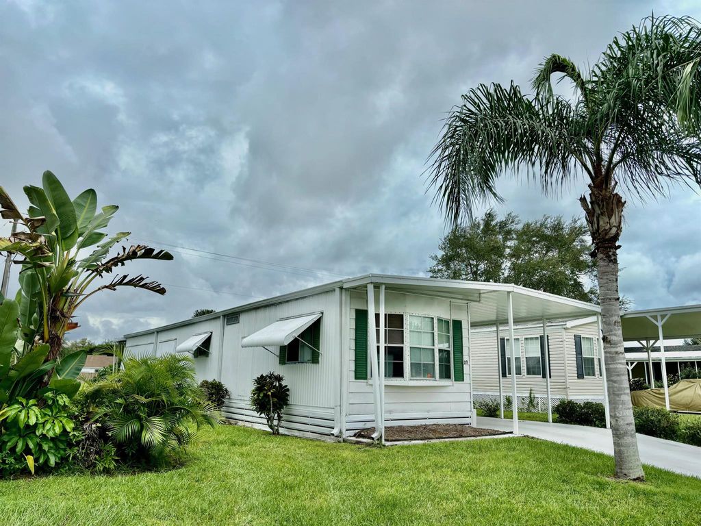 Photo of 29 San Marino Way, Port Saint Lucie, FL 34952 (MLS # R11024613)