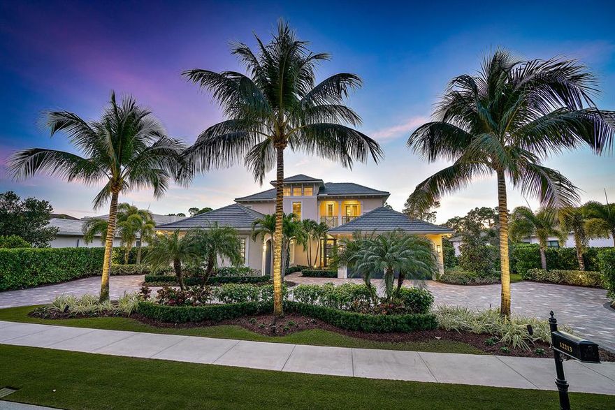 Spectacular Transitional style estate on 1/2 acre lot  with stunning golf course and lake views.  This spacious 4 bedroom open concept home is full of natural light. Designed to entertain with chef's kitchen and top of the line appliances featuring a wolf gas range, subzero refrigerator, wine refrigerator and separate ice maker.  Large den with private office and an additional media room are the perfect place to relax.  Custom designed walk in closets, elevator and beautiful finishes compliment this fabulous property.  A large covered lanai with summer kitchen and electric screens overlook the pool and spa on one of the best golf course lots.