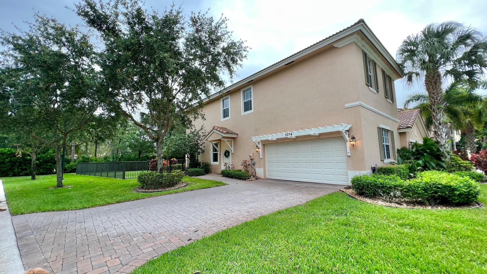 This beautiful townhouse in Palm Beach Gardens offers a perfect blend of modern living and serene outdoor spaces. The spacious layout features 3 bedrooms, 2 1/2 baths and a loft for office, seating or play area. The property is in mint condition and boast a large, fenced yard and mature landscaping provides a private oasis perfect for entertaining or unwinding after a long day. A large 2-car garage offers ample storage and parking space. Located within a gated community, residents have access to a beautiful pool, ideal for leisurely swims and social gatherings. The prime location ensures proximity to a variety of dining options, with numerous restaurants just a short distance away. Additionally, shopping needs are easily met with Alton Shopping Center, Publix, and the Gardens Mall.