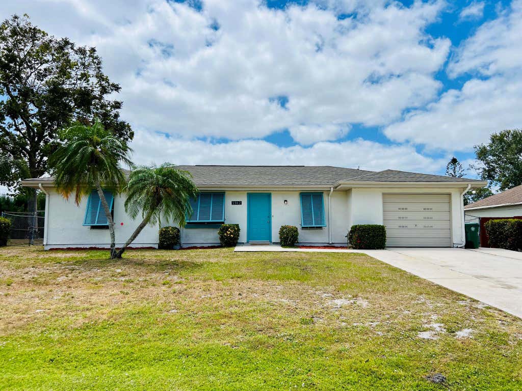 Photo of 1942 SE Carvalho Street, Port Saint Lucie, FL 34983 (MLS # R11086908)