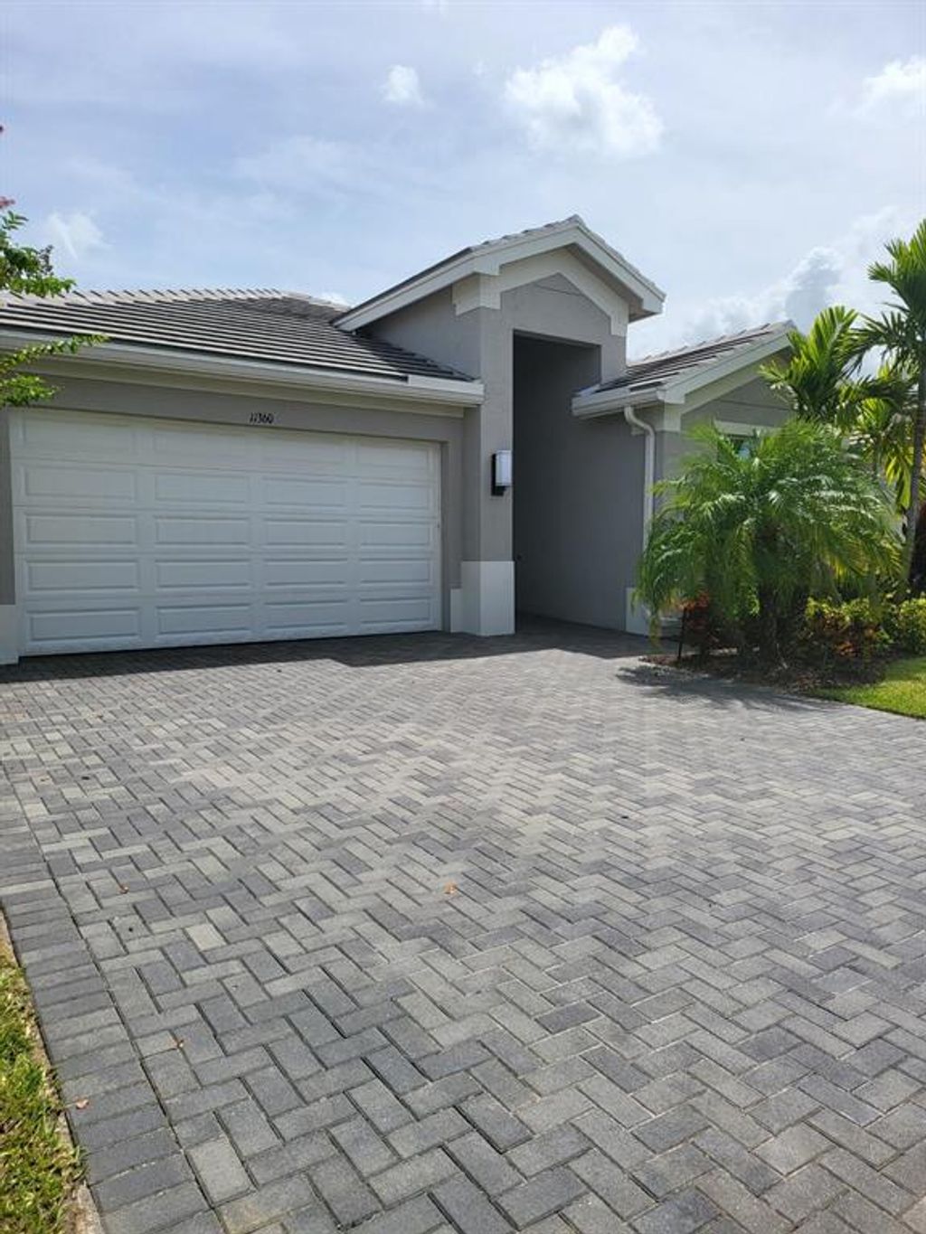 Photo of 11360 SW Willow Lane Ln, Port Saint Lucie, FL 34987 (MLS # R10824524)