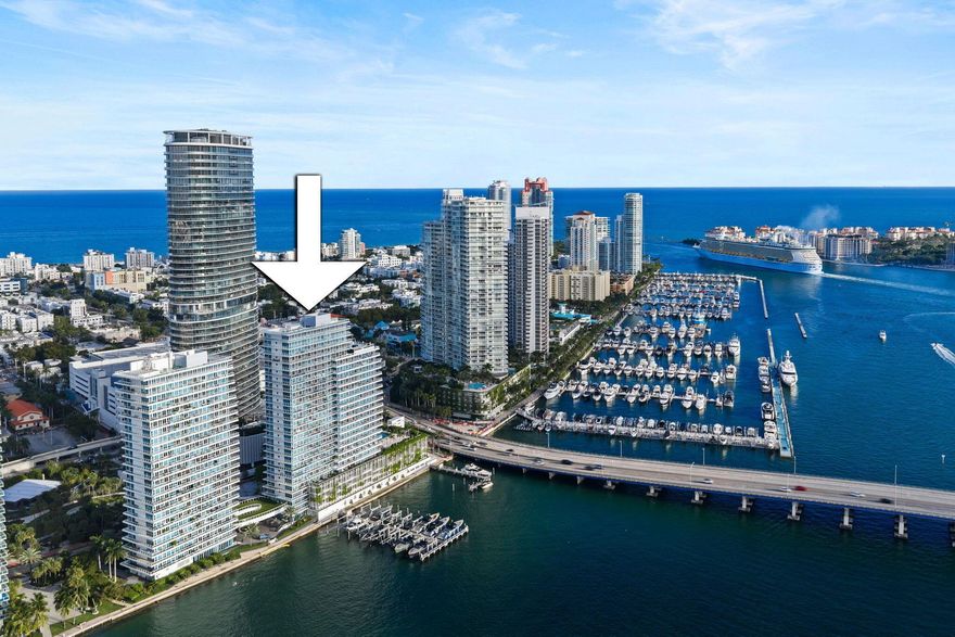 Fully renovated 2BD/2.5BA corner at Bentley Bay South with dramatic 280 wraparound bay, skyline & island views (Star/Palm/Hibiscus, PortMiami, Downtown/Brickell + ocean peek). High-end finishes, top appliances; reimagined from original 3BD (easy to convert back). Prime walkable spot near South Pointe Park, beach, Marina, SoFi dining, Canopy Park, and quick access to MacArthur & Venetian Causeways. Luxury amenities + concierge.