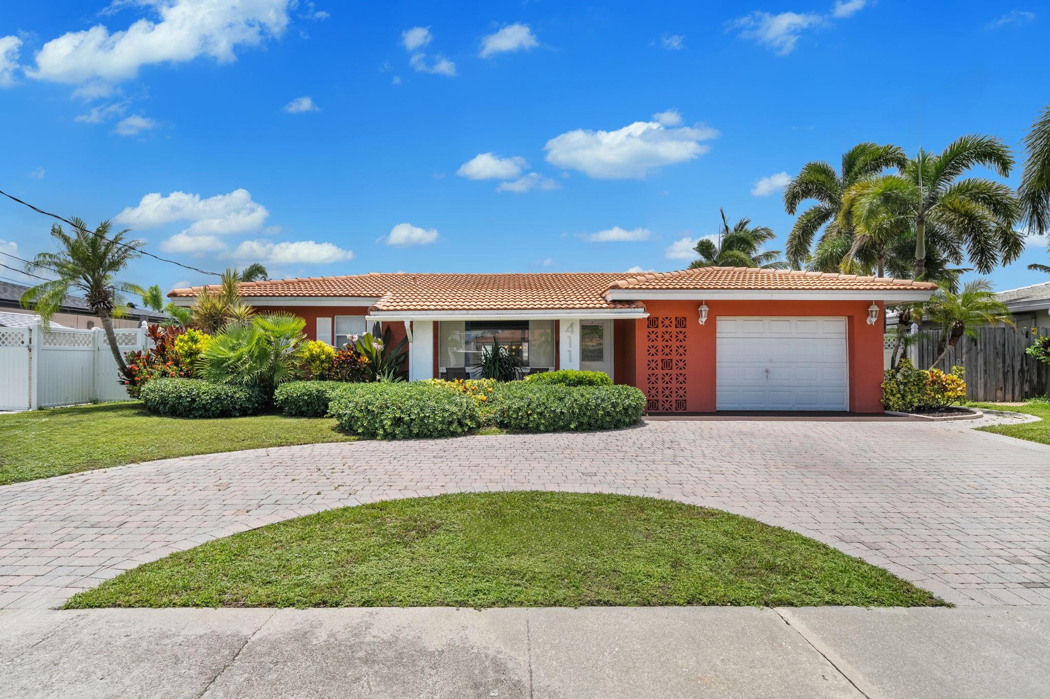 Indulge in elevated waterfront living in this beautifully maintained Garden Isles residence. Perfectly positioned on a wide ocean-access canal with no fixed bridges, this home offers tranquil sunset views and a private wooden dock in a no-wake zone. Inside, you’ll find an airy, open layout with a sunroom, elegant tile flooring, and spacious bedrooms—each with walk-in closets. The home features a 2023 HVAC system, gas water heater, and a durable tile roof. Outdoors, enjoy resort-style living with a refinished pool, fenced yard, and a stylish entertainment area—ideal for hosting. Additional highlights include a hurricane-impact rear door, 1-car garage, storage room, and no HOA. A rare opportunity to enjoy luxury, privacy, and true South Florida waterfront lifestyle.
PHOTOS TO COME