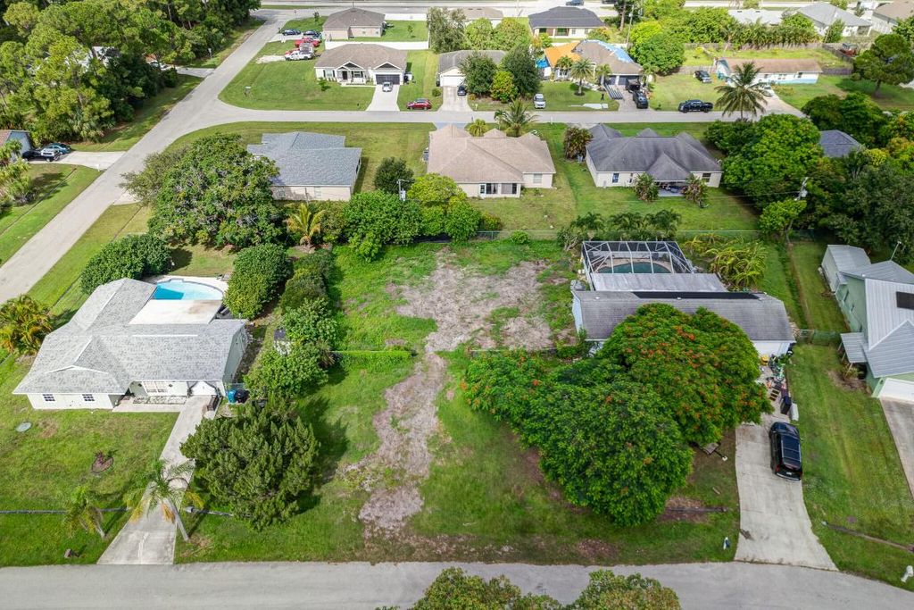 Photo of 1579 SW Fresno Road, Port Saint Lucie, FL 34953 (MLS # R11119416)