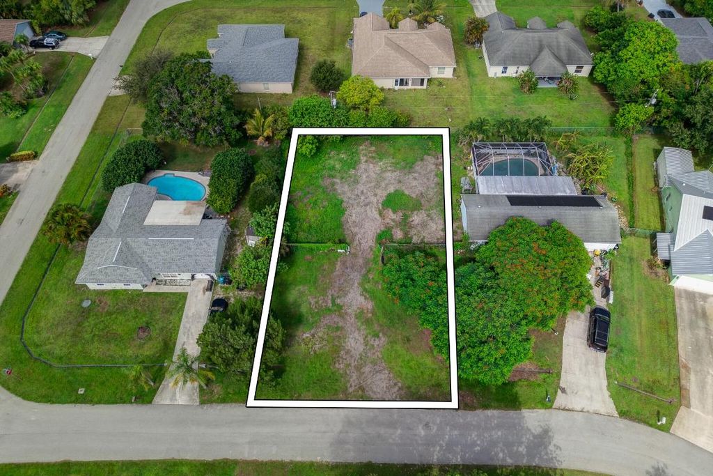 Photo of 1579 SW Fresno Road, Port Saint Lucie, FL 34953 (MLS # R11119416)