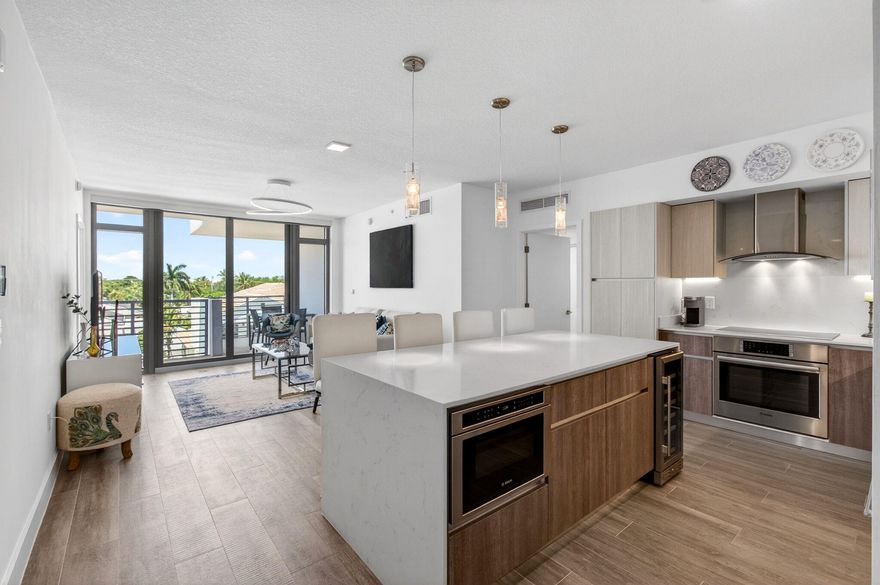 Welcome to effortless luxury living in the heart of Downtown Delray Beach. This Impeccably maintained 2-bedroom , 2- bath residence at 111 First Delray offers the ultimate lock-and- leave lifestyle just moments from Atlantic Avenue, the beach, award- winning restaurants, boutiques, cafes, and nightlife.  Built in 2019, this pristine condo blends modern sophistication with the energy of one of South Florida's most desirable coastal destinations. Inside, you will find a designer kitchen featuring Quartz counter tops, Bosch appliances, upgraded cabinetry, and a wine cooler - perfect for entertaining or unwinding after a day in the sun. You will also enjoy motorized shades throughout as well as custom build closets in each room.  What truly sets this residence apart is the lifestyle. Step outside your door and experience everything Delray Beach is known for - morning walks to the ocean, brunch on Atlantic Ave, art galleries, fitness studios and endless dining options - all at your fingertips.  111 First Delray offers resort style amenities including a 5th floor fitness center overlooking the pool. A 3rd floor heated  pool and spa with a breeze you will enjoy. There are cabanas, a fire pit, outdoor lounge with a bar and summer kitchen, billiards, bike storage, extra storage and more. Two assigned parking spaces complete the package- a rare luxury in Downtown Delray.  Whether you are looking for a full time residence, seasonal retreat, or a low maintenance luxury escape, this residence delivers the best of everything.