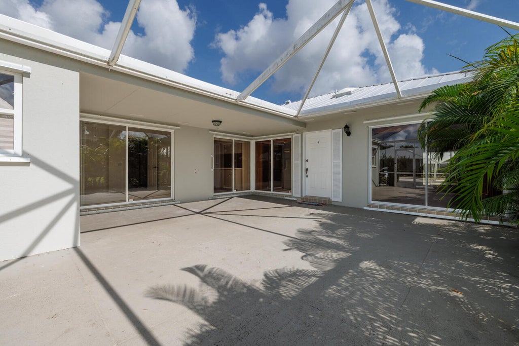 Photo of 1560 SW Waterfall Boulevard, Palm City, FL 34990 (MLS # B26045483)