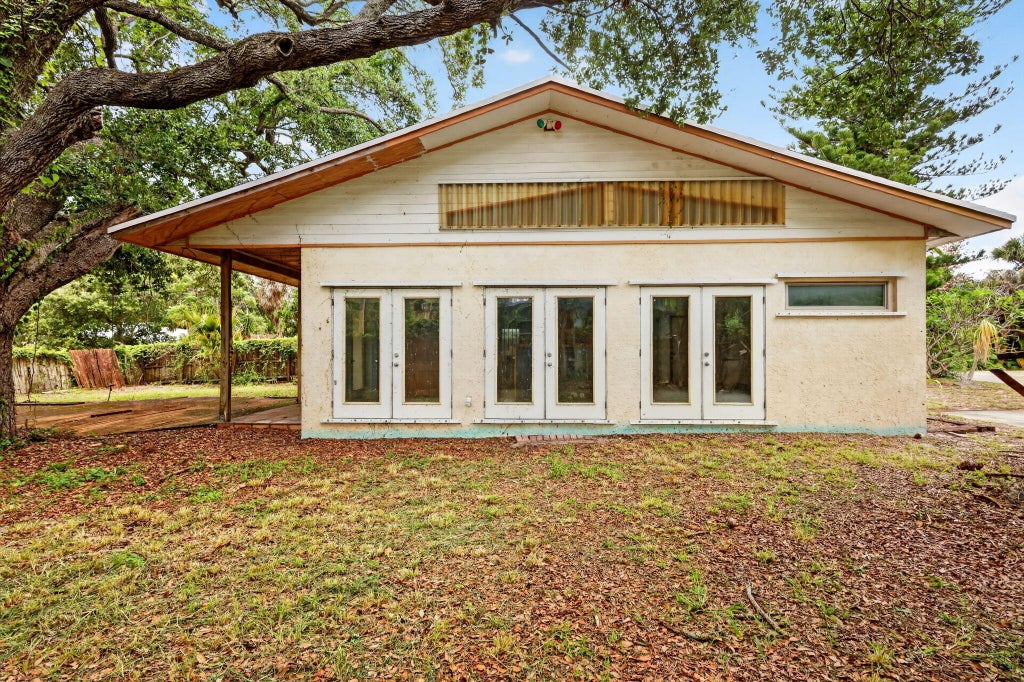 Photo of 968 NE Kubin Avenue, Jensen Beach, FL 34957 (MLS # B26027952)