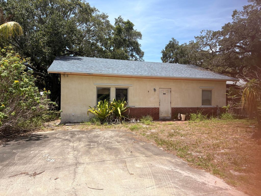 Photo of 968 NE Kubin Avenue, Jensen Beach, FL 34957 (MLS # B26027952)