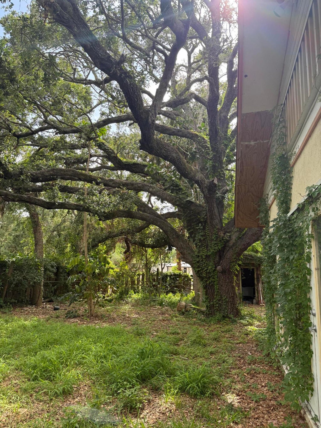 Photo of 968 NE Kubin Avenue, Jensen Beach, FL 34957 (MLS # B26027952)