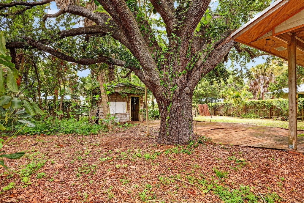 Photo of 968 NE Kubin Avenue, Jensen Beach, FL 34957 (MLS # B26027952)