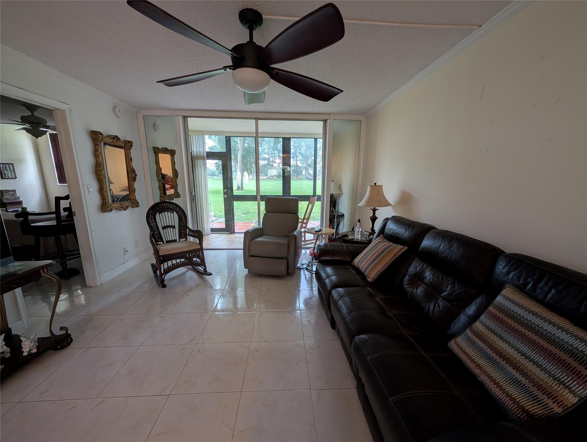 Great first floor unit. Beautiful floor tiles. Updates that matter Newer Kitchen cabinets, Electrical Panel, Blinds, Shutters. Must see quality unit. Near pool, the Golf course is your backyard view.
Close to all major attractions Airports and Cruise Ports in Broward and Miami. Near to major Casinos including Hard Rock Cafe and Big Easy Casino. Short Drive to stunning beaches in both Broward and Miami. Hollybrook Golf & Tennis has strict rules: 700 credit score, $84,800.00 Annual Income for each of last 2 years or Minimum Net Worth of $250,000. To receive Certificate of Occupancy from the Association, Buyer must make a deposit of $8,480 which is refundable after 3 years.