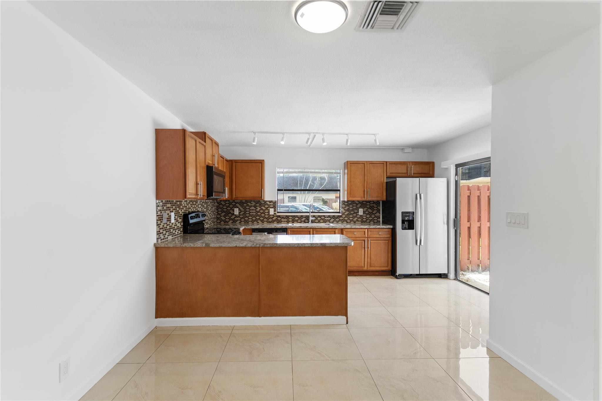 VILLAS AT WOODLAND GREENS - Residential