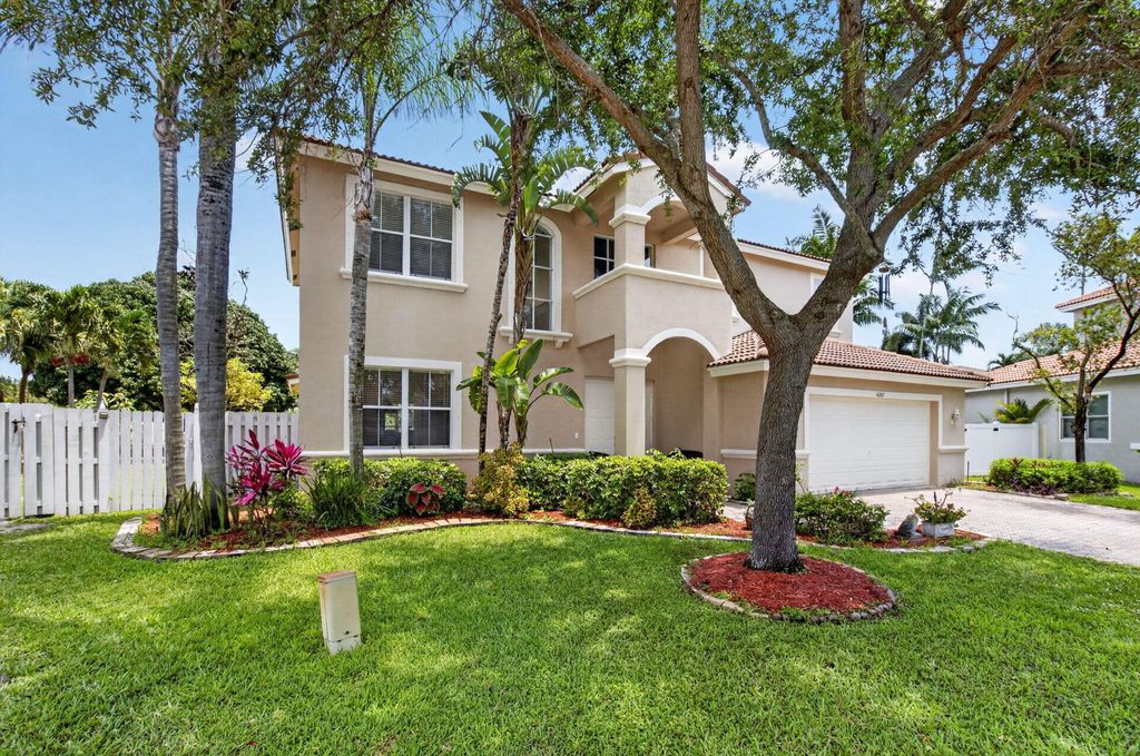 Photo of 6207 Shadow Tree Lane, Lake Worth, FL 33463 (MLS # B26029034)