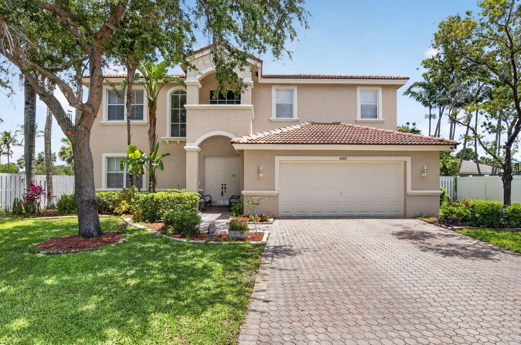 Photo of 6207 Shadow Tree Lane, Lake Worth, FL 33463 (MLS # B26029034)