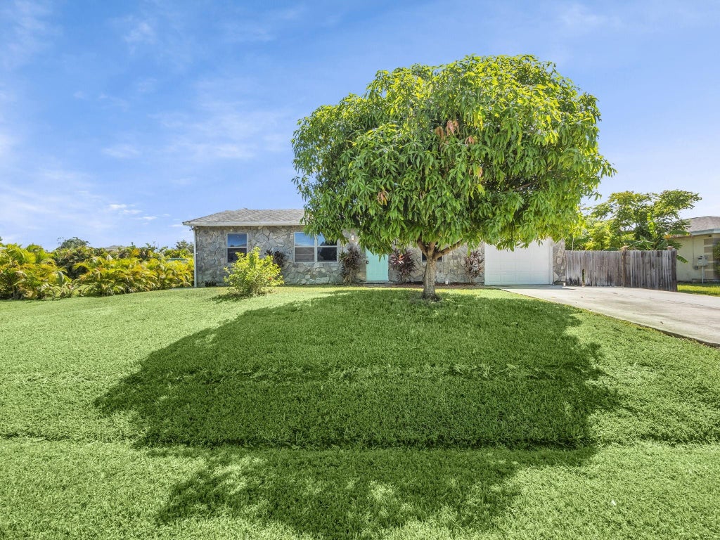 Photo of 1757 SE Aires Lane, Port Saint Lucie, FL 34984 (MLS # F10519314)