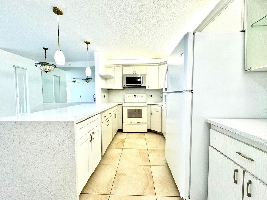 Photo of 3744 Savoy Lane #B2, West Palm Beach, FL 33417 (MLS # R11163633)