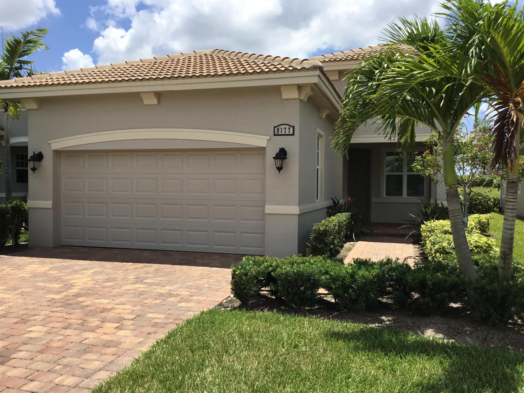 Home for Rent in Beautiful PGA Verano! Welcome to resort-style living in the heart of PGA Verano, one of the Treasure Coast's most sought-after gated communities. This immaculate 2-bedroom + spacious den/office, 2-bath, 2-car garage home was built in 2022 and offers modern elegance paired with luxurious comfort. Step inside to a light-filled open great room floor plan with high ceilings, stylish finishes, and a seamless flow perfect for entertaining or relaxing. The kitchen features sleek cabinetry, quartz countertops, stainless steel appliances, breakfast nook & space for bar stools at the counter. The den/office provides flexible space ideal for remote work, a hobby room, or even a guest area. The primary suite includes a walk-in closet and a spa-like en-suite bath with dual vanities