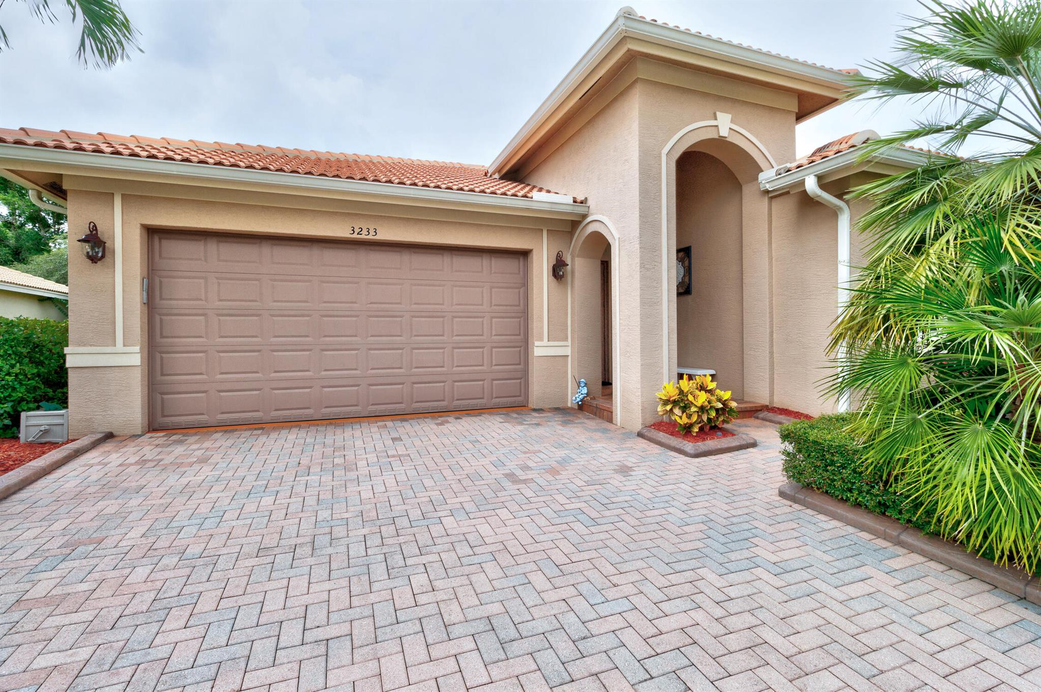 Buyers - you can just move right into this home! Extremely well maintained 3/2/2 open floor plan with impact windows and so many extras. This home has wonderfully engineered space. Newer appliances. Generator hook-up. Excellent tropical views to the preserve. Laminate flooring. Enjoy the resort style Clubhouse with a huge heated pool & spa, fitness center, Har-tru tennis courts, bocce ball, billiard room, full time onsite property manager and the best social calendar around. Close to great dining, shopping and, of course, Vero's beautiful beaches. Must see home.