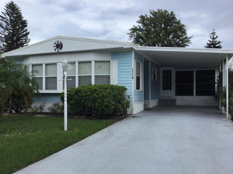 Photo of 114 Camino Del Rio, Port Saint Lucie, FL 34952 (MLS # B26070080)