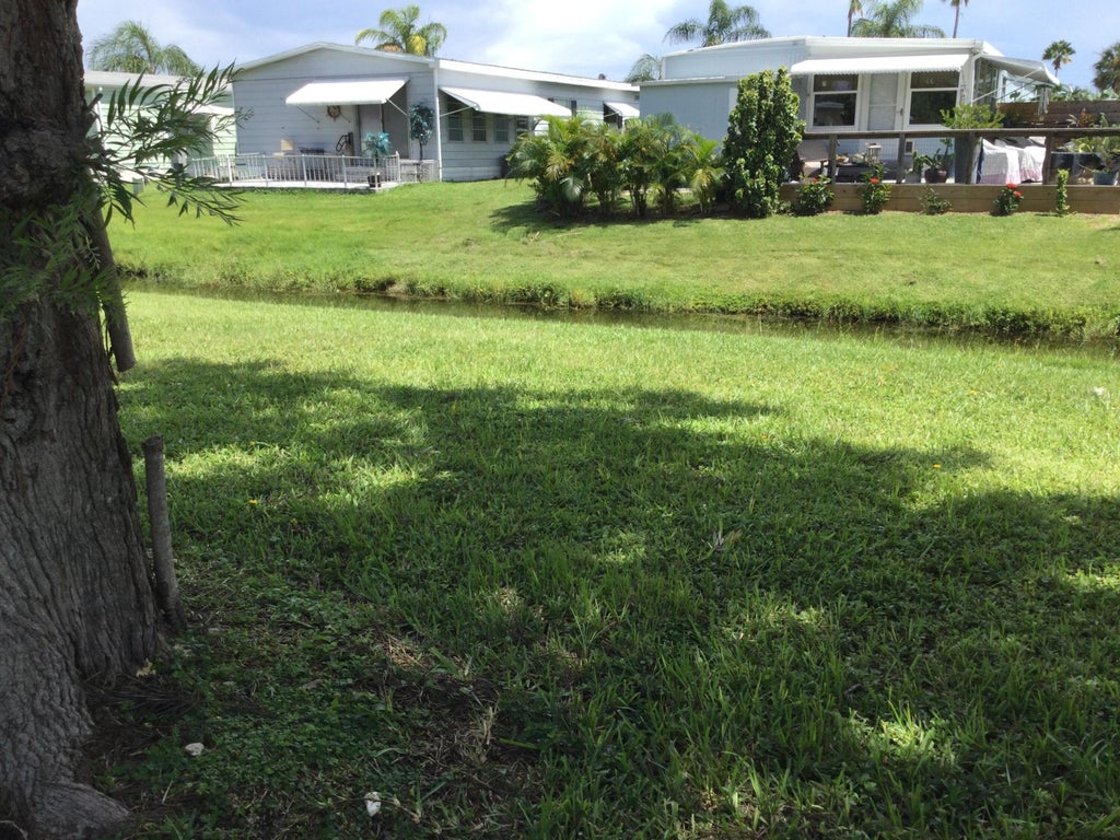 Photo of 114 Camino Del Rio, Port Saint Lucie, FL 34952 (MLS # B26070080)