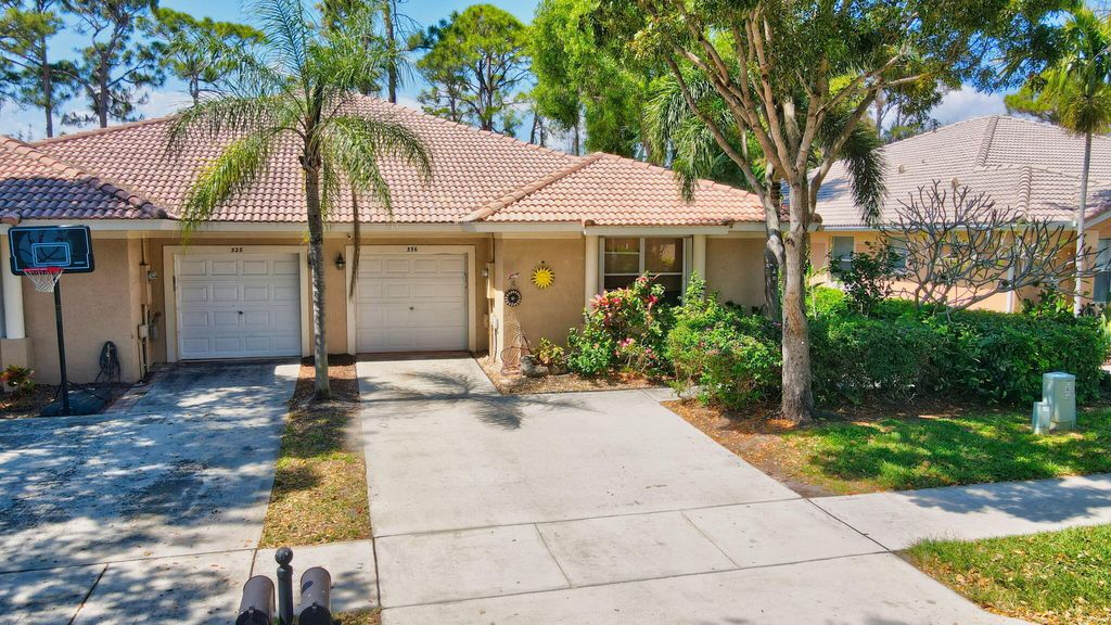 Photo of 336 W Coral Trace Circle, Delray Beach, FL 33445 (MLS # B26003991)