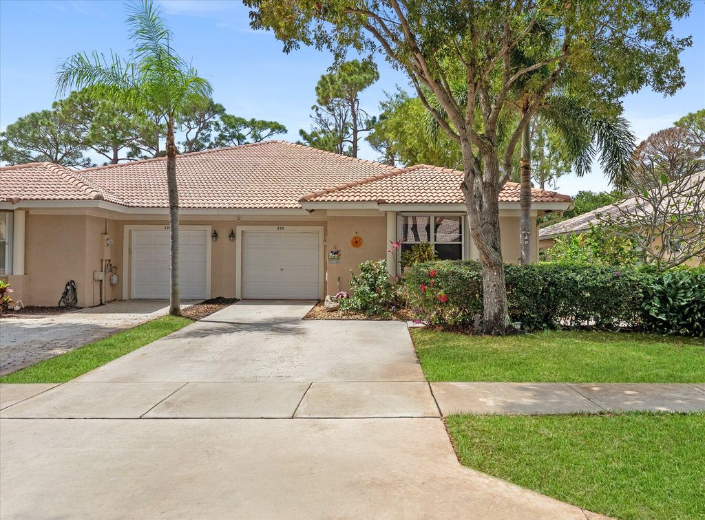 Photo of 336 W Coral Trace Circle, Delray Beach, FL 33445 (MLS # B26003991)
