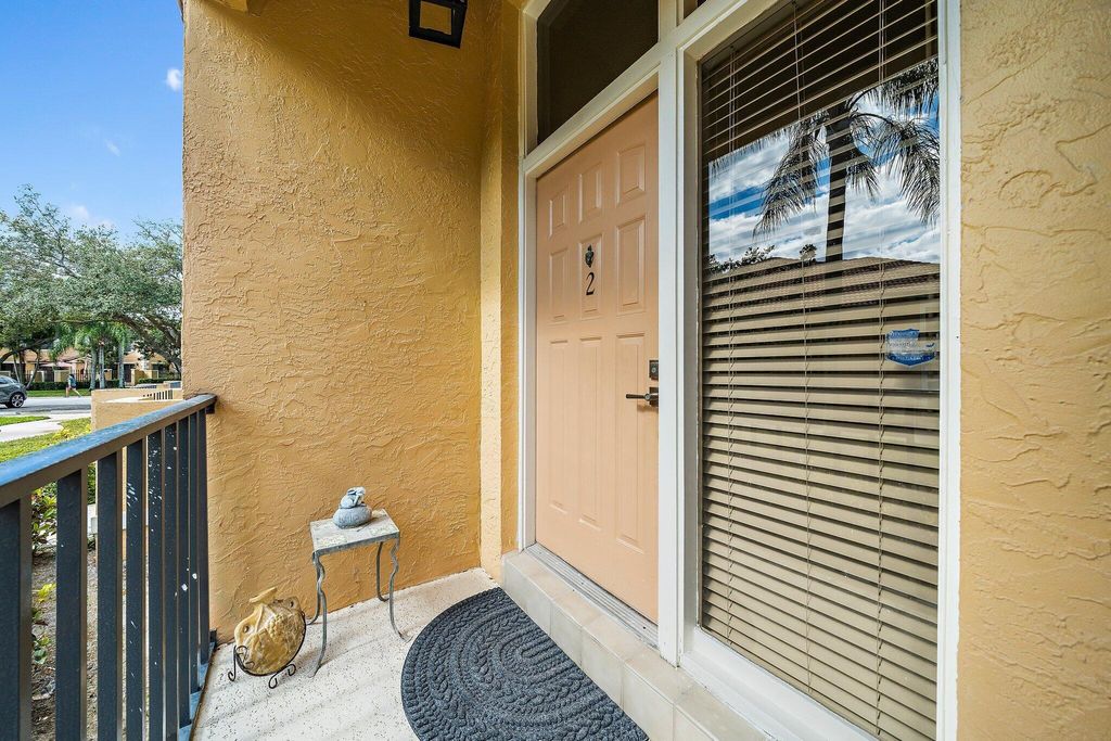 Photo of 382 Prestwick Circle #2, Palm Beach Gardens, FL 33418 (MLS # R11003546)