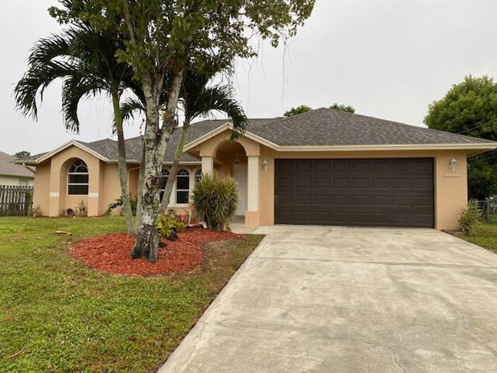 Photo of 3343 SW Mcmullen Street, Port Saint Lucie, FL 34953 (MLS # R10754596)
