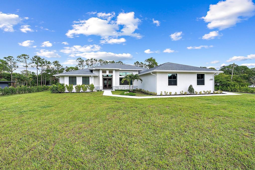Photo of 12913 169th Court N, Jupiter, FL 33478 (MLS # R11133193)