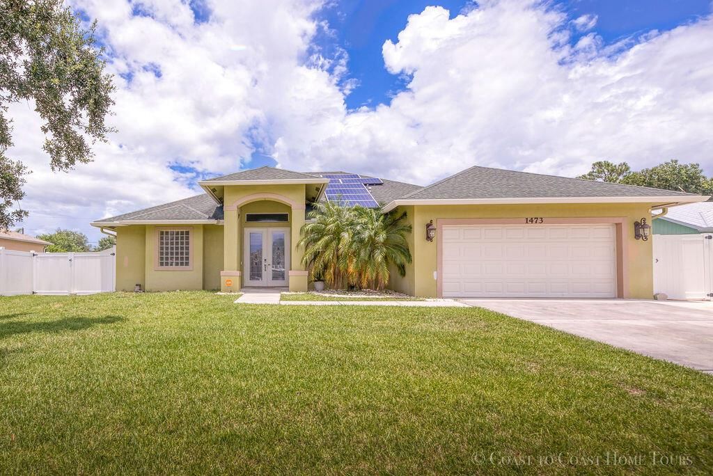 Photo of 1473 SW Dow Lane Ln, Port Saint Lucie, FL 34953 (MLS # R10813770)