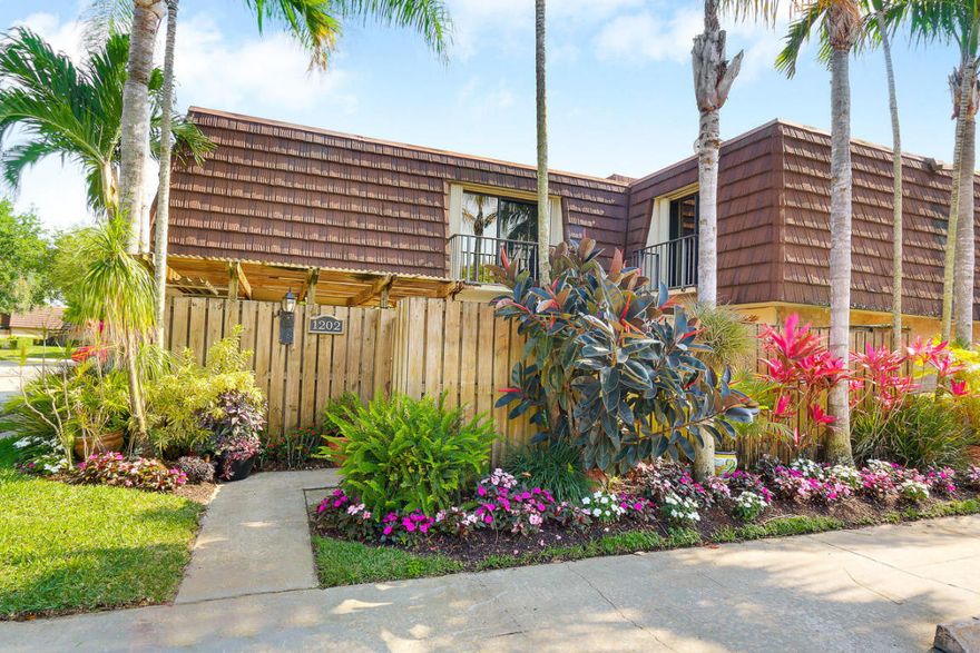 Totally remodeled from top to bottom! Move in do nothing! This 3 bedroom townhome boasts 18'' Saturnia Marble floors, crown molding throughout, Accordion hurricane shutters and three remodeled bathrooms finished in marble, granite and porcelain. The kitchen has been totally restructured with Ashwood Yorktown solid wood custom cabinetry, Ubatuba granite & new appliances. The master suite is finished with beautiful arched crown molding and remodeled bathroom with marble & stone shower. The home also features a large patio, under stair storage, phantom screen at front door, newer A/C, Hot water heater,& washer/dryer. Just a short walk to the heart trail and park...right in the center of Palm Beach Gardens! Low HOA dues($133/MO)! Conveniently located next to Publix Plaza & The Gardens Mall