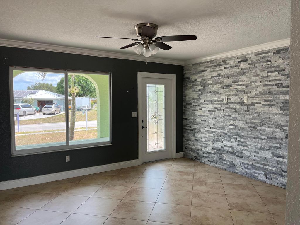 Photo of 698 SW Bridgeport Drive, Port Saint Lucie, FL 34953 (MLS # R10973599)