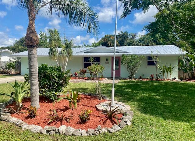 Super location for this comfortable 3 bedroom, 2 bath home in Stuart's Westwood section . Updated primary bedroom with walk in closet and sliders to screened porch. Recent paint and carpeting in bedrooms. Large fenced back yard with newer aluminum storage shed. Hurricane shutters for whole house. Close to schools, shopping and Stuart/Jensen amenities. By appointment only .