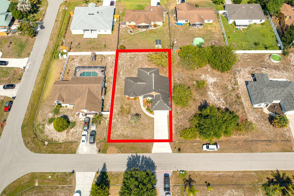 Photo of 3586 SW Pumpkin Street St, Port Saint Lucie, FL 34953 (MLS # R10810012)