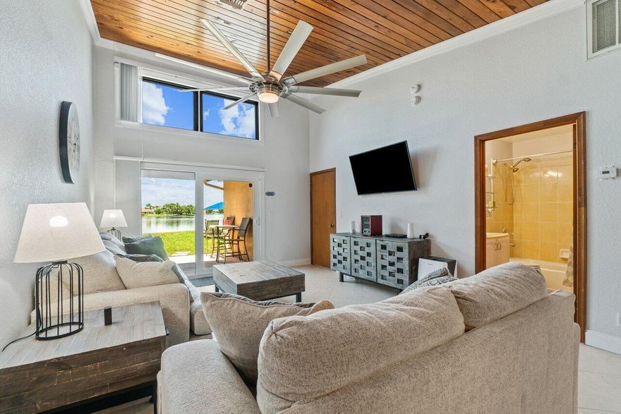 Come look at this stunning and quiet waterfront property on Lake Wellington. No HOA, dually trucks are allowed with a private driveway. Garage for storage. Very close to everything. Also enjoy one of the three 55'' smart TVs and the 11,000 channel TV service to include local, regional, international, pay-per-view, sports, live events and more. Take the kayak on the lake or relax catching some fish in the backyard. Enjoy the bright, open kitchen and living area with gorgeous sunsets over the lake or maybe catch every Thursday evening entertainment and food trucks at the Wellington pavilion. The major updates to this 2 Bed, 2 Bath with a pull-out queen couch include: new roof, new windows, and doors. HVAC system with allergen filtration, whole house ionizer for clean air, backup power for internet, TVs, and computers in every room. Newer furniture, appliances, filtered water and ice fridge enhanced by a reverse osmosis system (kitchen sink and fridge), and a police and fire monitored security system.  DISCLAIMER: All information provided to you regarding this Property by Realtor and her associates has been obtained from third parties such as the Multiple Listing Service, public records and other sources. All tenants should independently verify all information provided regarding this Property. The Landlord, Realtor and Broker make no representation as to the accuracy of this information. All Tenants should perform their own independent due diligence regarding this Property before executing a Residential Lease for this Property.